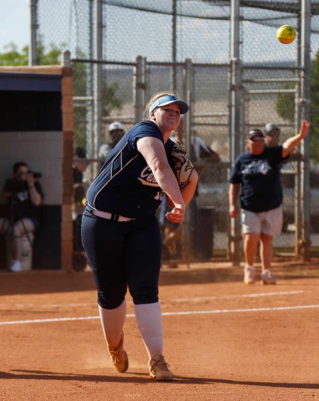 Centennial pitcher Amanda Sink (18) throws the ball to first base in the fourth inning of th ...