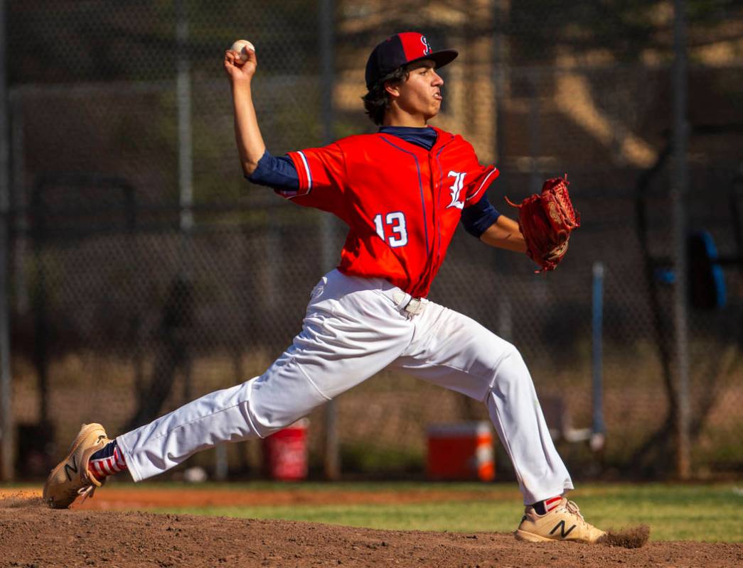 Liberty pitcher Devin Contreras (13) sends another throw towards the plate versus Spring Val ...