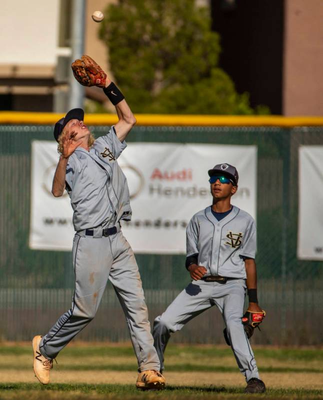 Spring Valley’s Chasyn Love (23) looks in a pop fly versus Liberty during the first ro ...