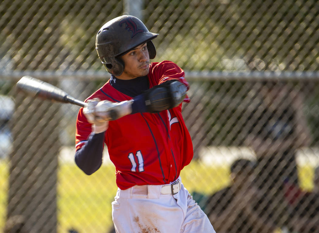 Liberty’s James Katona (11) eyes a pitch versus Spring Valley during the first round o ...