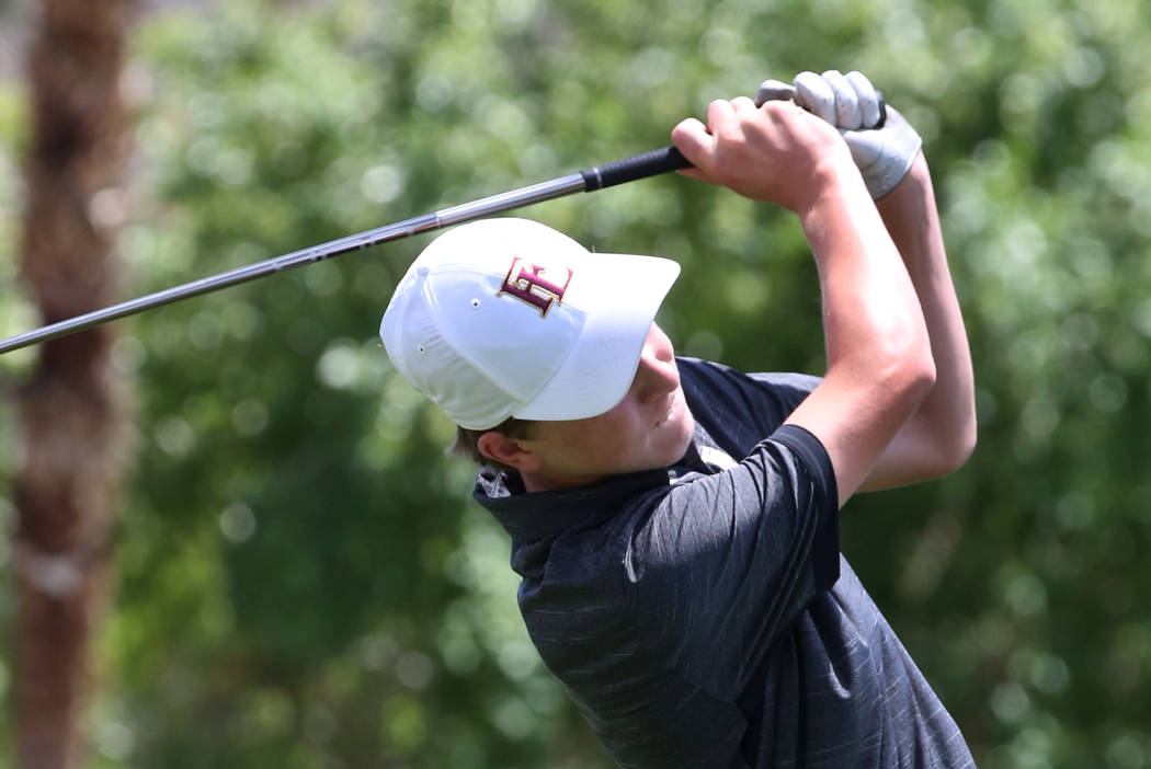Faith Lutheran’s Colton Cherry watches his drive during the Nevada State High School R ...