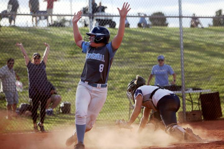 Centennial High School’s Ashlynn Heck (8) makes a home run, winning the game 3-2 again ...