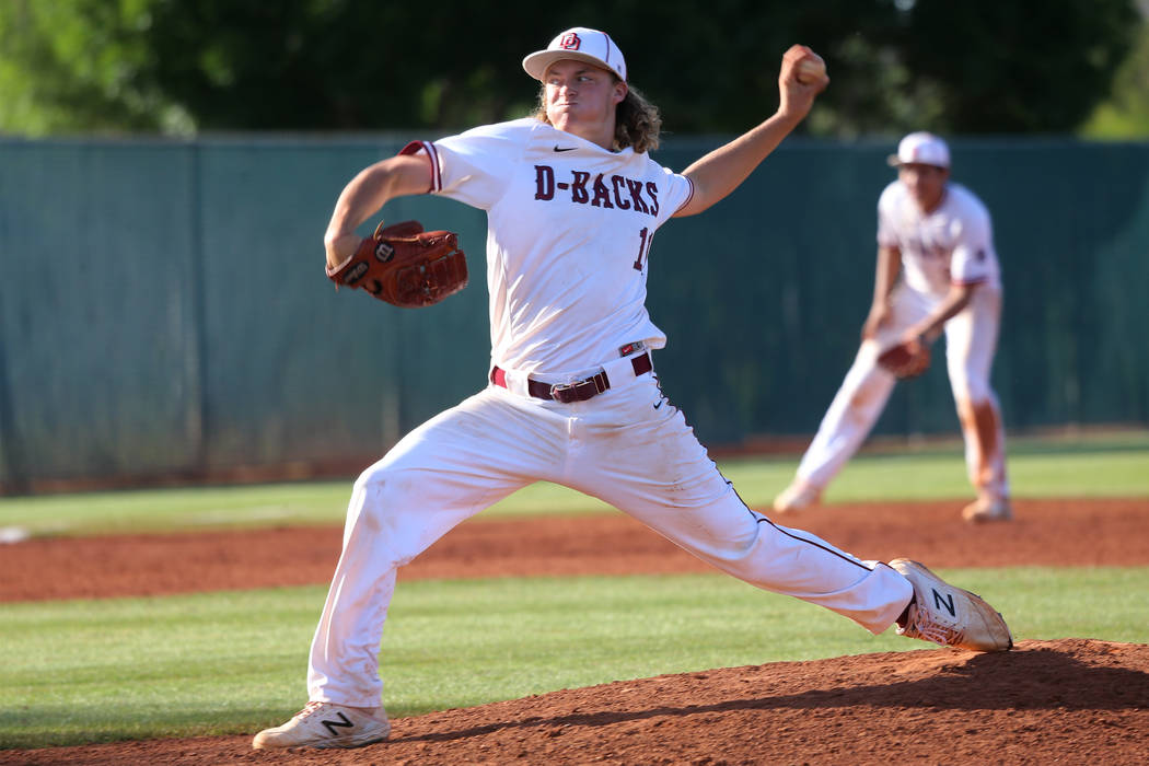 Desert Oasis’ Josh Sharman (11) pitches against Basic in the Desert Region championshi ...