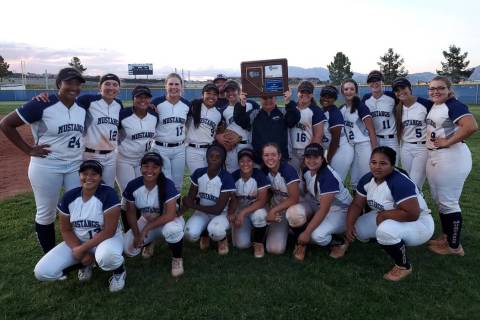 Shadow Ridge poses with the Mountain Region trophy after defeating Centennial, 3-2 in 11 inn ...