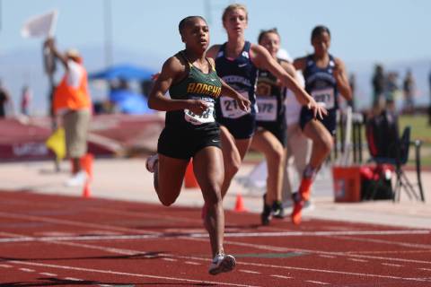 Rancho’s Amir’a Edmond (843) runs for first place, followed by teammate Aniya Sm ...