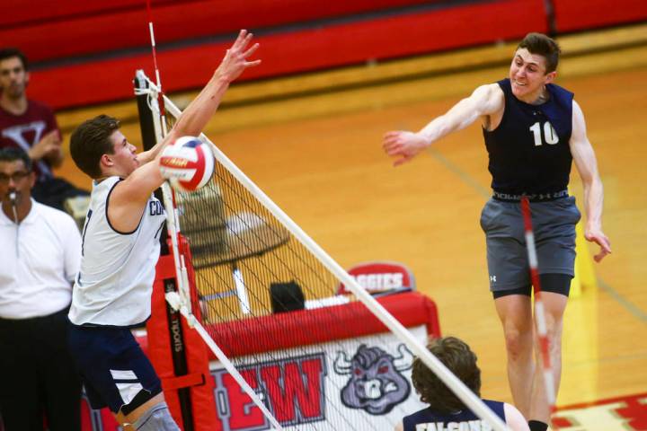 Foothill’s Caleb Stearman (10) spikes the ball past Coronado’s Jacob Ceci (7) du ...