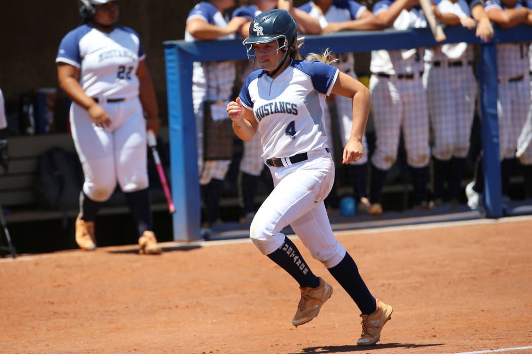 Shadow Ridge’s Shea Clements (4) runs home for a run against Coronado in the Southern ...