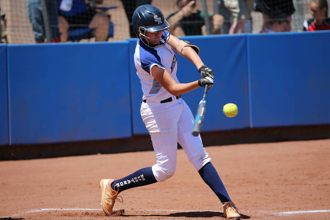 Shadow Ridge’s Hailey Morrow (12) hits the ball for a solo homer against Coronado in t ...