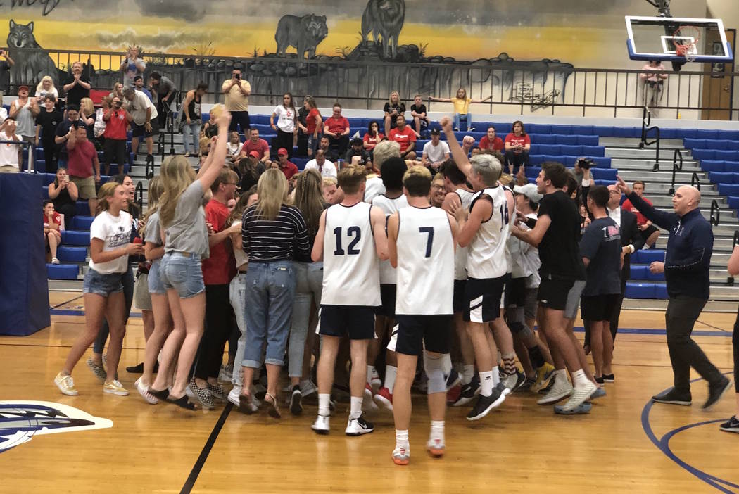 Coronado players celebrate with their fans after the Cougars defeated Arbor View, 19-25, 25- ...