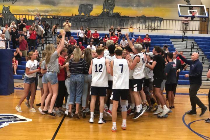 Coronado players celebrate with their fans after the Cougars defeated Arbor View, 19-25, 25- ...