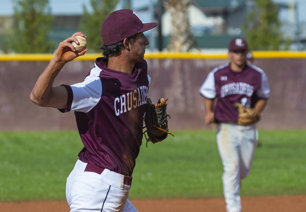 Faith Lutheran’s Michael Rice (2) looks to first base on a throw versus Palo Verde dur ...