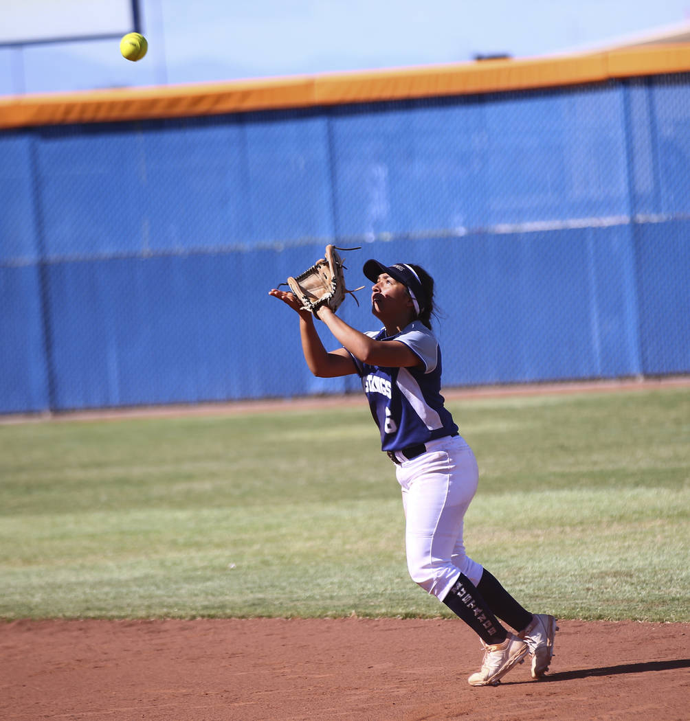 Shadow Ridge’s Angelina Esqueda (6) catches a fly ball from McQueen’s Kiera Esca ...