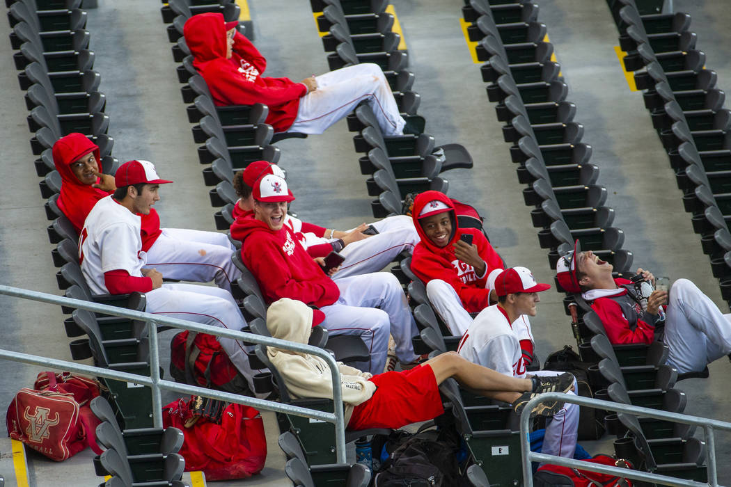 Arbor View players share some laughs in the stands before their game versus Las Vegas during ...
