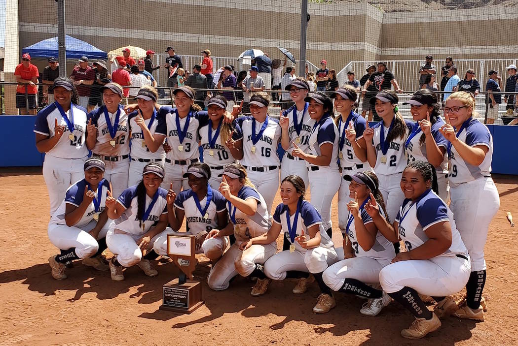 Shadow Ridge players pose for a team photo after defeating Coronado, 13-3 in the Class 4A st ...