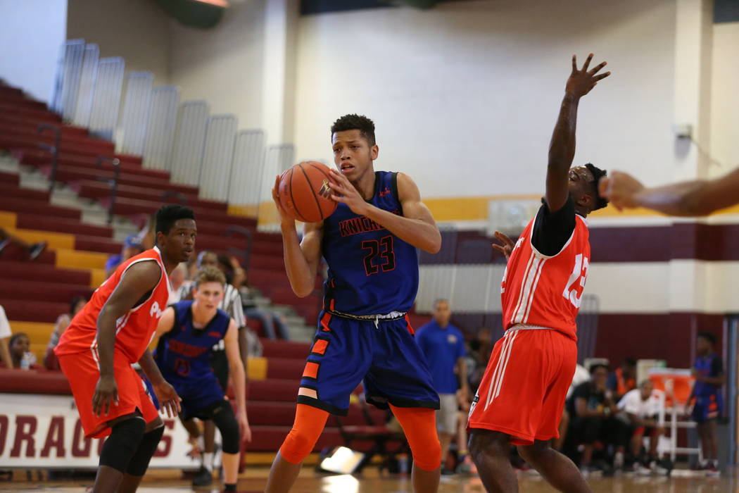 Las Vegas Knicks guard Nick Blake (23) looks for an open shot during his basketball game at ...