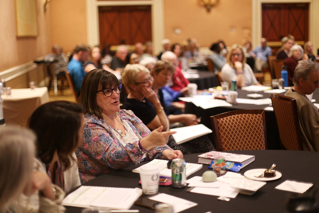 Stephanie Ruckstuhl, of Canada, asks a question at the International Lewy Body Dementia Confere ...