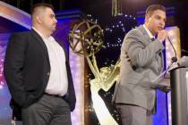 Raul Saldivar, left, and Leo Saucedo accept an award at the 2019 National Academy of Television ...