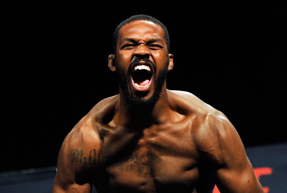 Jon Jones reacts during the the final weigh-in before his light heavyweight title bout against ...
