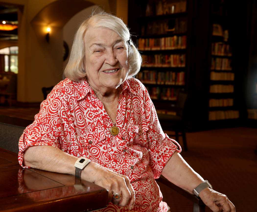 Artist Hannelore Lowrey in the library of her living facility Wednesday, June 26, 2019. (K.M. C ...