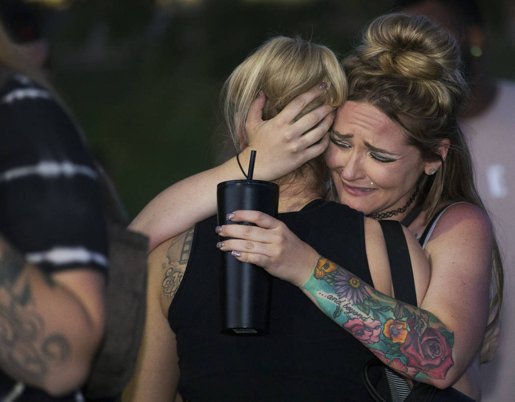 Friends and family mourn Max Garcia during a vigil for the Las Vegas man on Monday, July 1, 201 ...