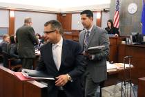 Defense lawyer Christopher Oram, left, who represents former Las Vegas Convention and Visitors ...