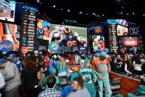 Fans gather in front of the stage during the 2019 NFL Draft Thursday, Apr. 25, 2019, in Nashvil ...