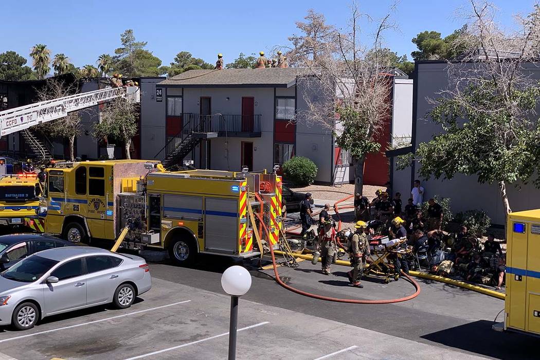 The Clark County and Las Vegas fire departments are fighting a fire at an apartment complex at ...