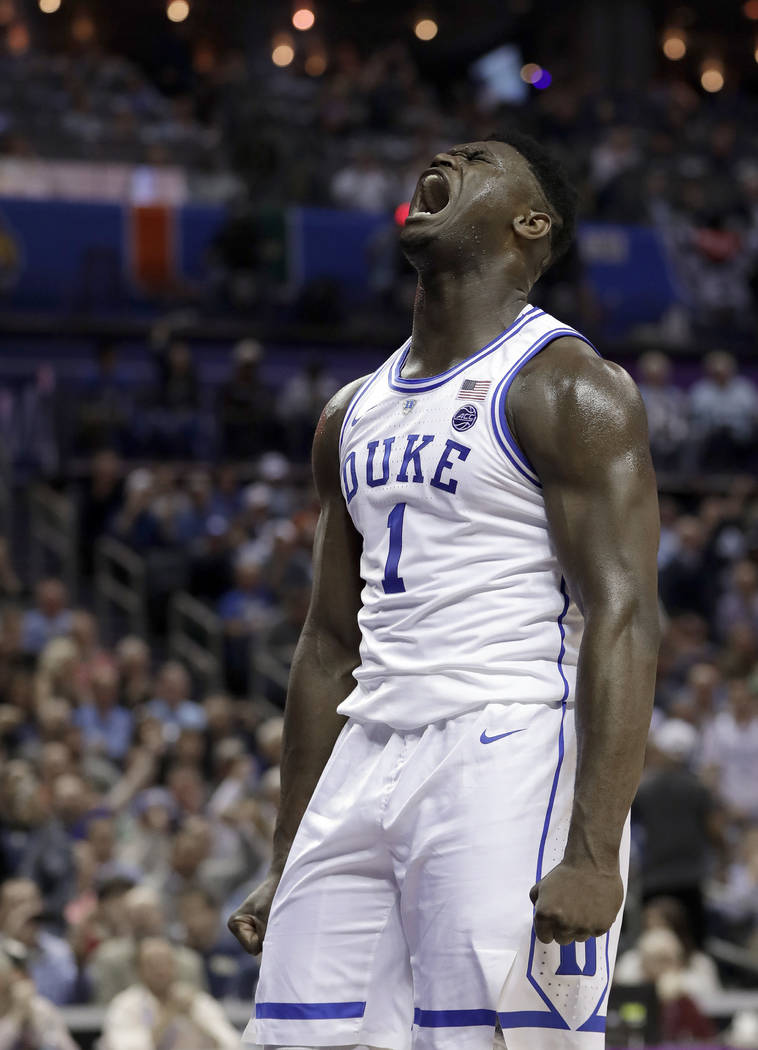 Duke's Zion Williamson (1) reacts after his basket against Syracuse during the first half of an ...