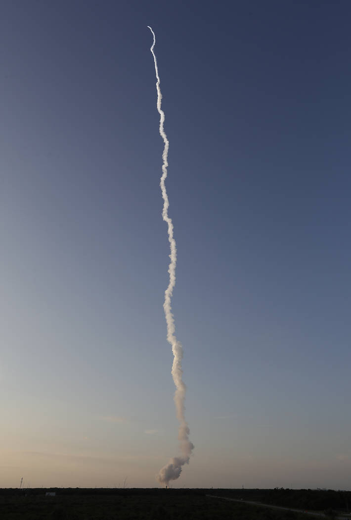 A NASA Orion spacecraft lifts off from pad 46 at the Cape Canaveral Air Force Station Tuesday, ...
