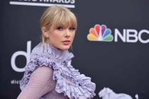 In this May 1, 2019, file photo, Taylor Swift arrives at the Billboard Music Awards at the MGM ...