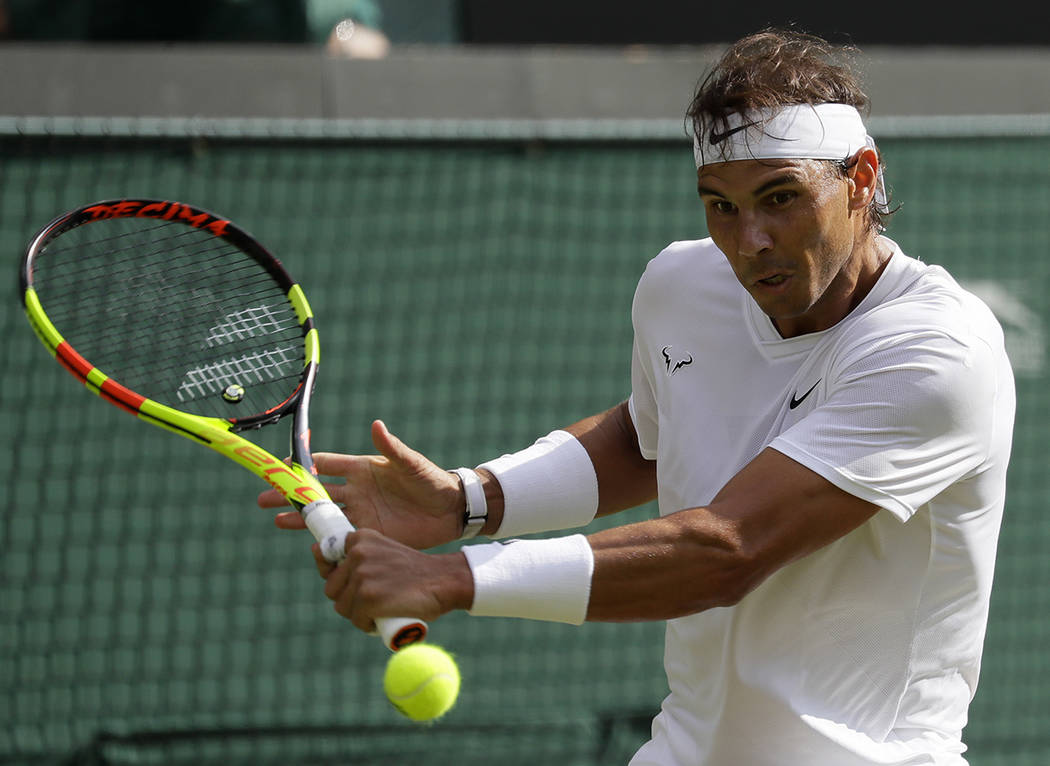 Spain's Rafael Nadal returns to Japan's Sugita Yuichi in a singles match during day two of the ...