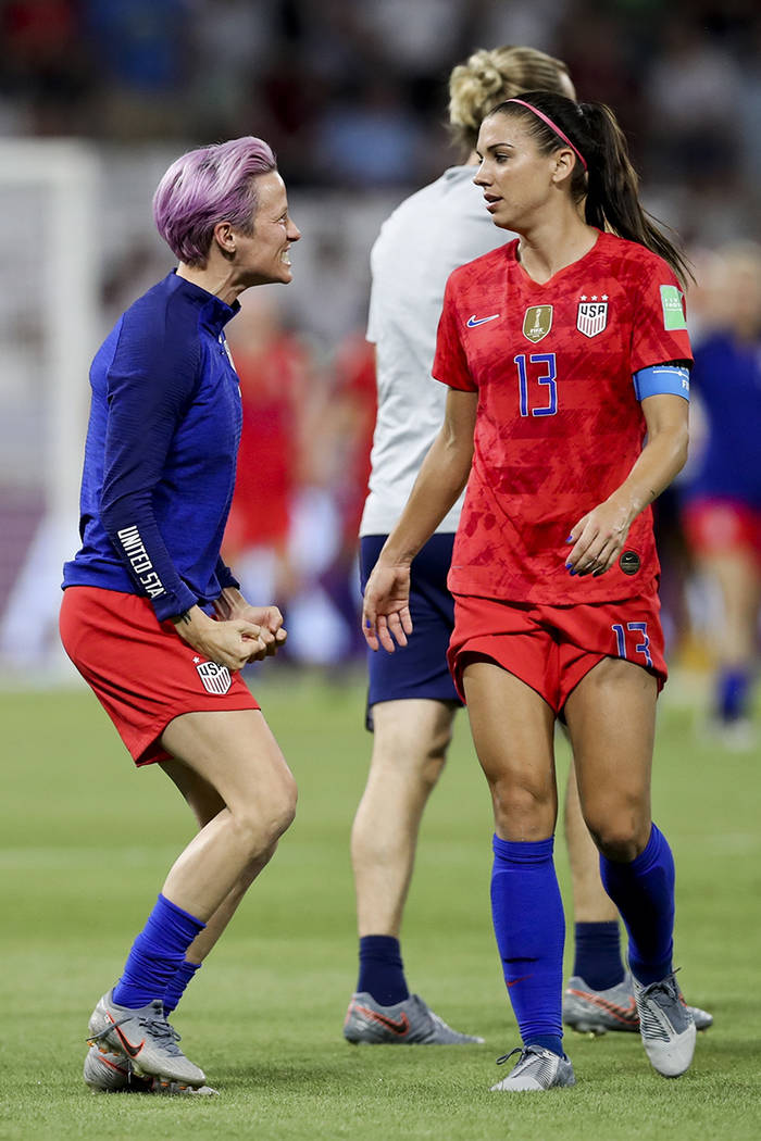 United States' Megan Rapinoe, left, celebrates with teammate Alex Morgan their team's victory a ...