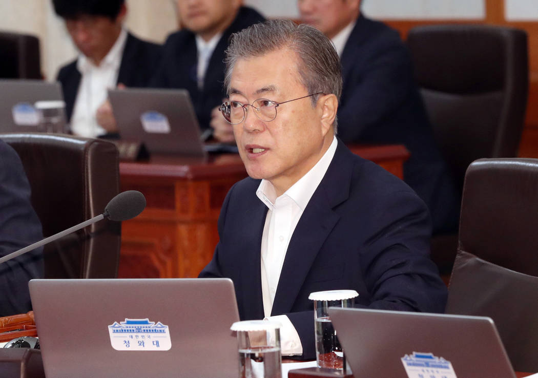 South Korean President Moon Jae-in speaks during a cabinet meeting at the presidential Blue Hou ...