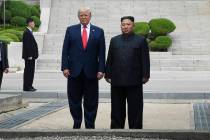 President Donald Trump and North Korean leader Kim Jong Un stand on the North Korean side in th ...