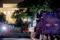 Two Bradley Fighting Vehicles are parked next to the Lincoln Memorial before President Donald T ...