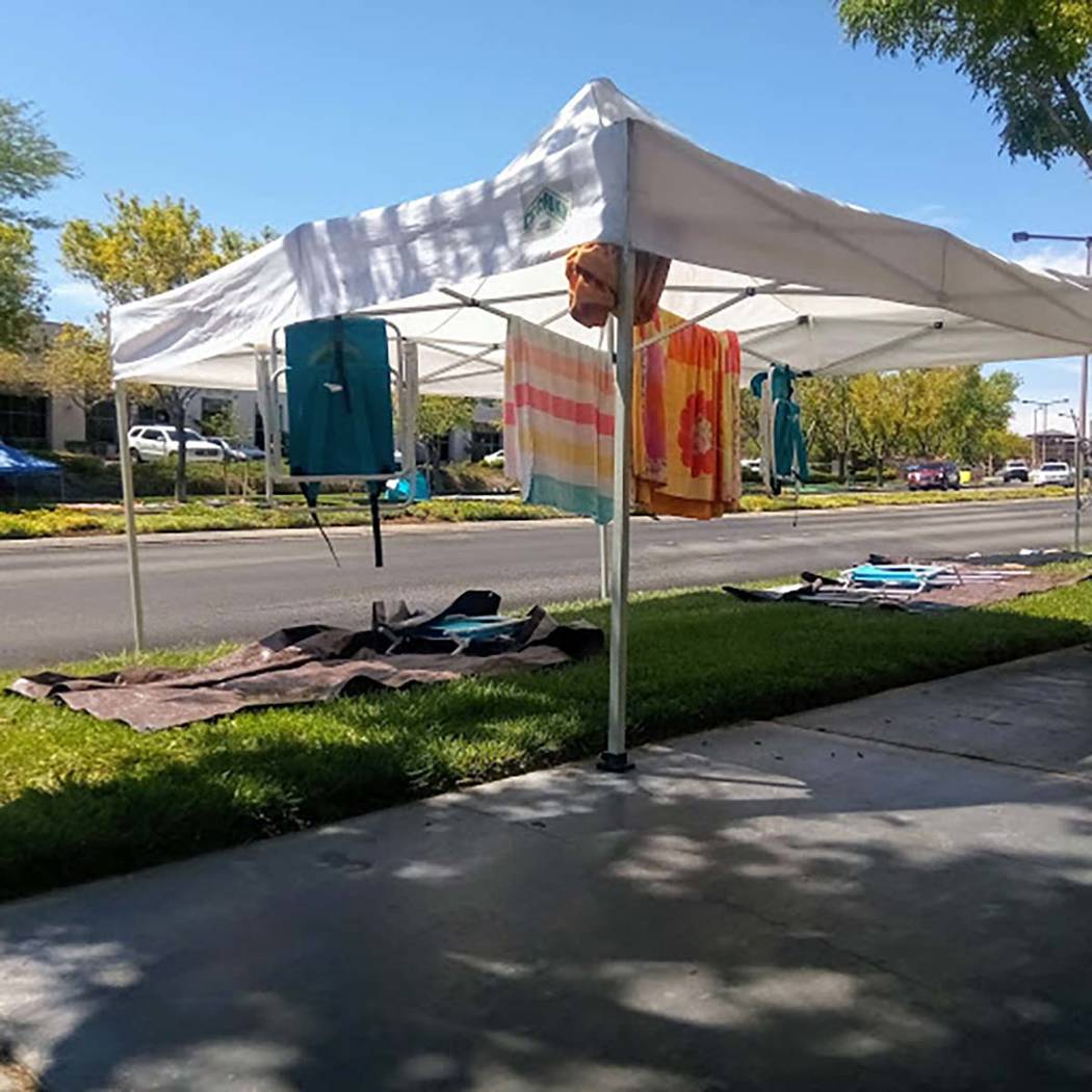 Canopies to provide shade form the sun abound along the parade route for the 25th annual Summer ...