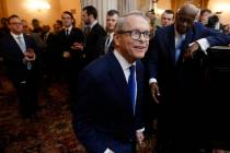 FILE - In this March 5, 2019 file photo, Ohio Governor Mike DeWine enters the Ohio House chambe ...