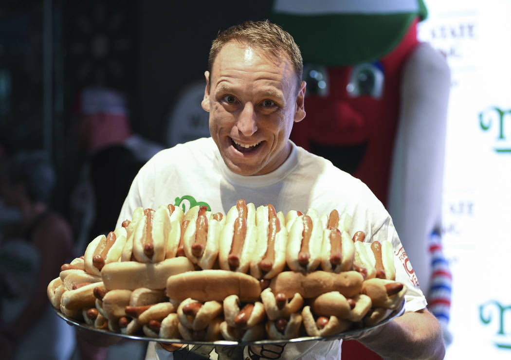 Eleven-time and defending men's champion Joey Chestnut participates in Nathan's Famous internat ...