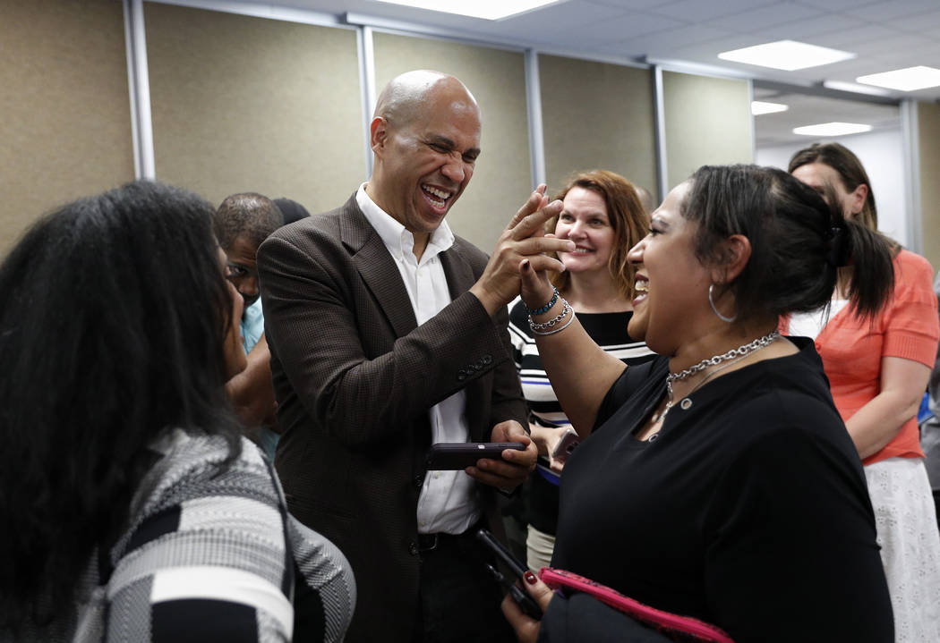 Democratic presidential candidate Sen. Cory Booker meets with people after speaking at a Vetera ...