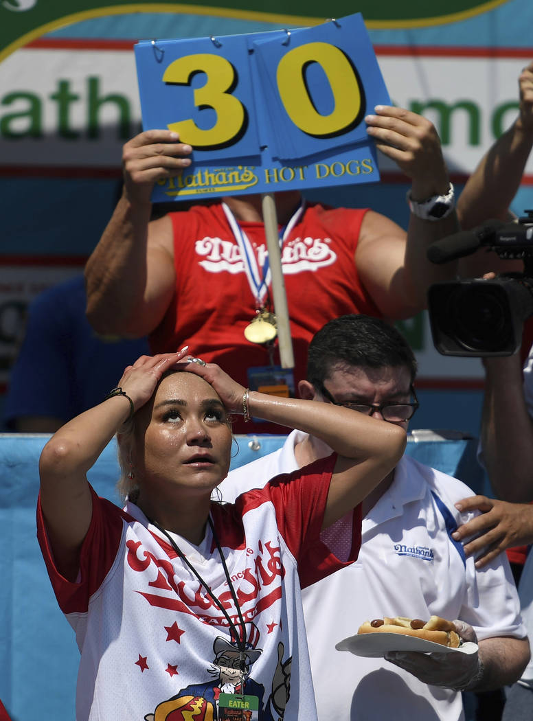 Miki Sudo reacts after the clock runs out in the women's competition of Nathan's Famous July Fo ...