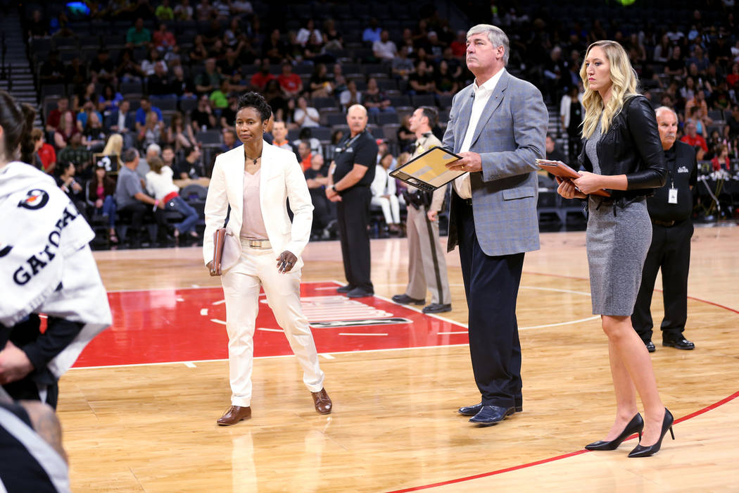 Las Vegas Aces assistant coach Vickie Johnson, left, head coach Bill Laimbeer and assistant coa ...