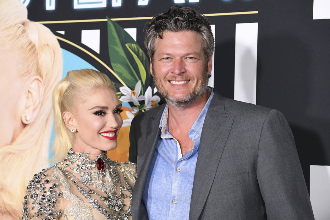 Gwen Stefani and Blake Shelton arrive on the red carpet for her new residency at Planet Hollywo ...