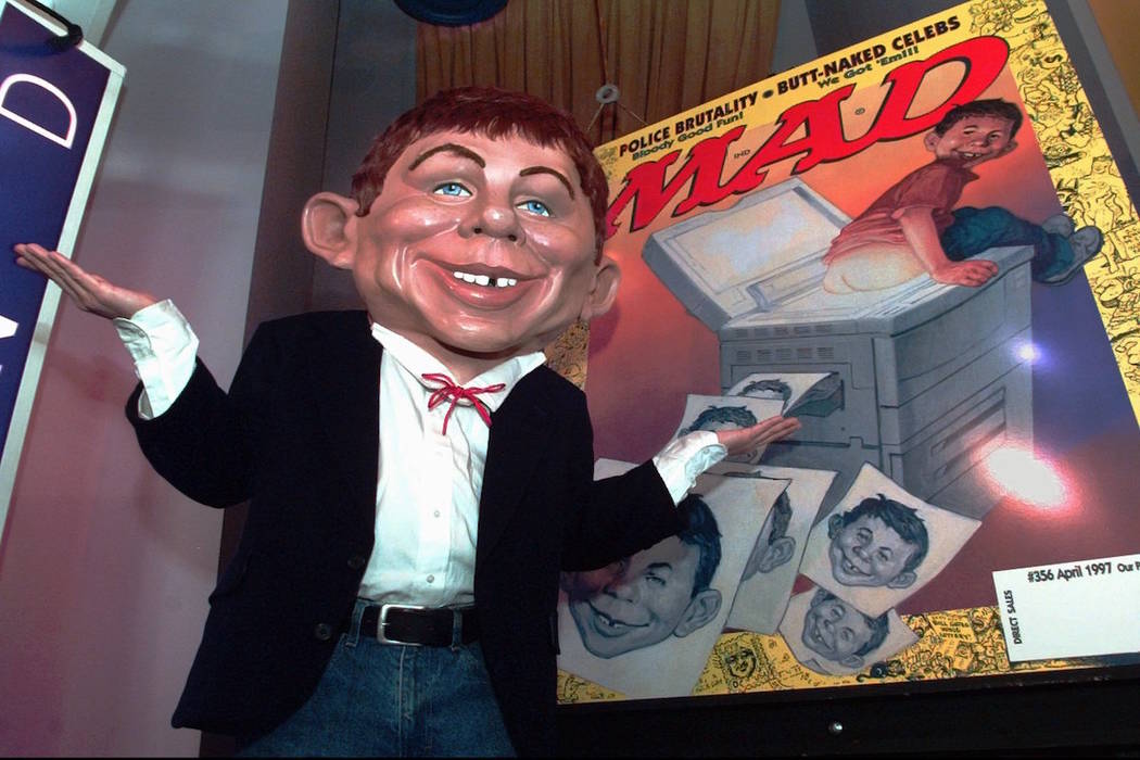 Mad Magazine mascot Alfred E. Neuman shows off the debut cover of the publication's new look at ...