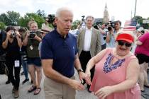 Former vice president and Democratic presidential candidate Joe Biden greets local residents wh ...