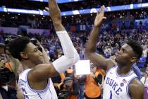 Duke's RJ Barrett (5) and Zion Williamson (1) celebrate after defeating Florida State in the NC ...