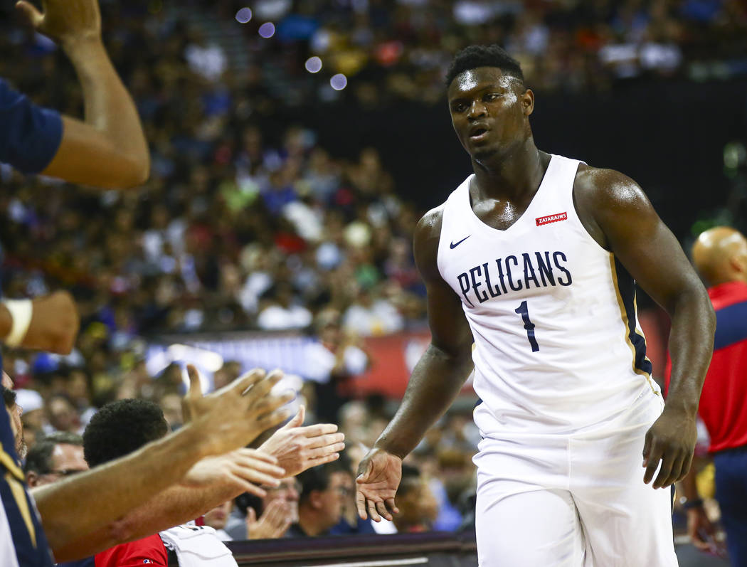 New Orleans Pelicans' Zion Williamson (1) returns to the bench as the team plays the New York K ...
