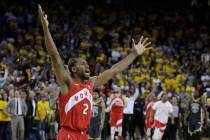 Toronto Raptors forward Kawhi Leonard celebrates after the Raptors defeated the Golden State Wa ...