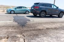 Traffic drives over a patched section of Highway 178 between Ridgecrest and Trona, Calif., on F ...