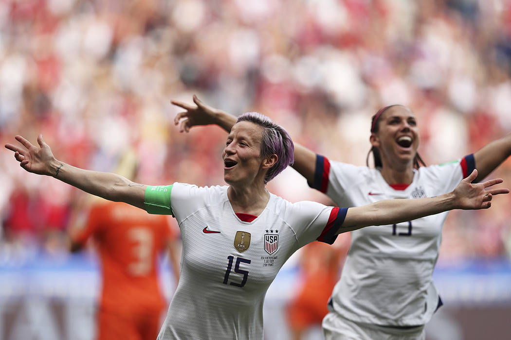 United States' Megan Rapinoe celebrates after scoring the opening goal from the penalty spot du ...