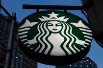 This is the Starbucks sign outside a Starbucks coffee shop in downtown Pittsburgh on Wednesday, ...
